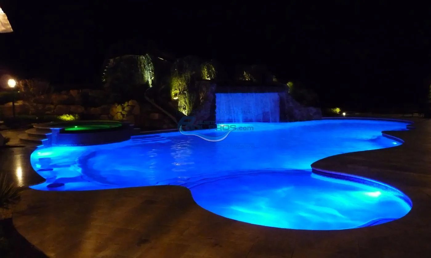 inground pool lights at night installation, luxury swimming pool, pool builders